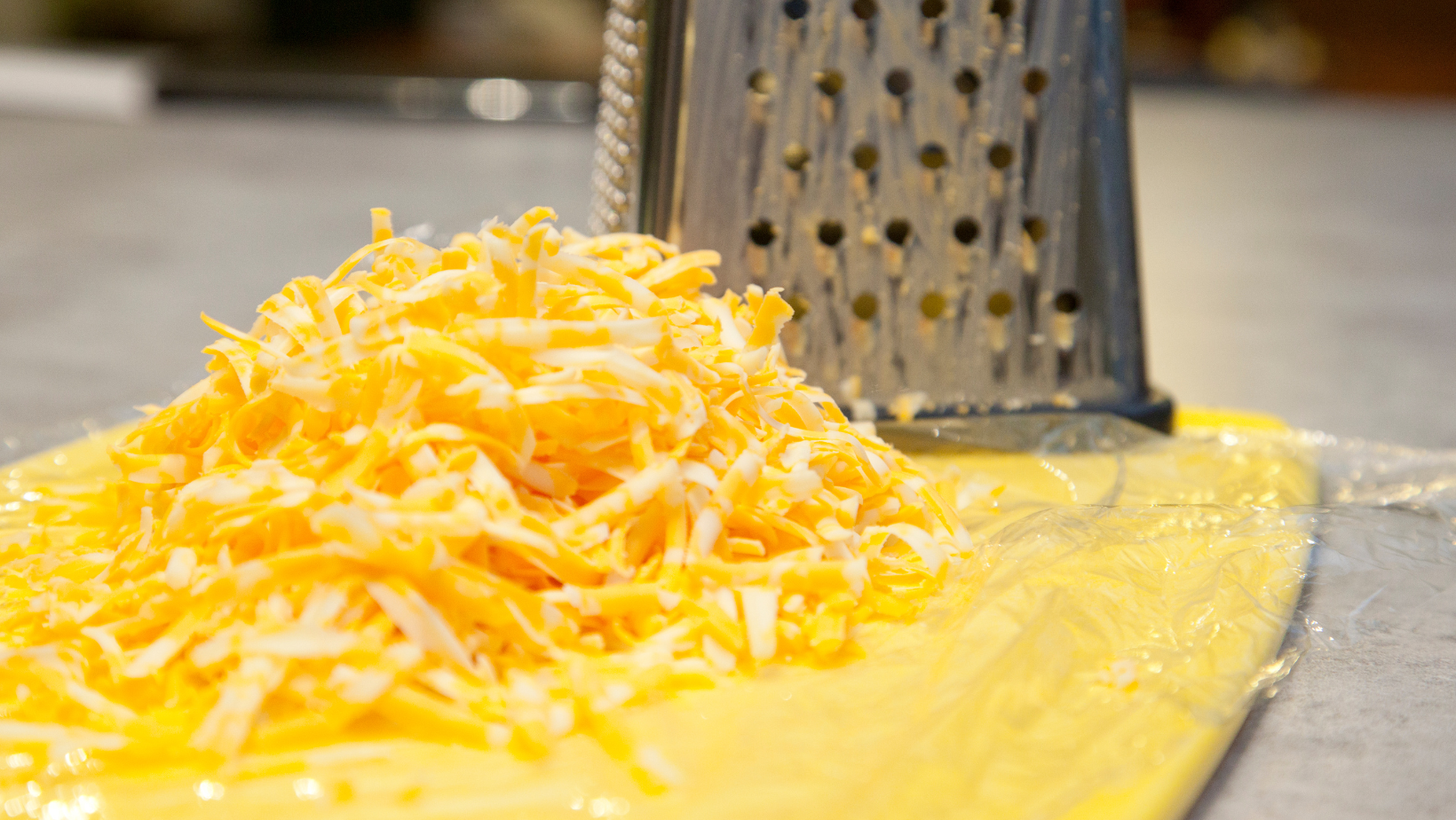 You are currently viewing Why Shredding and Grating Your Own Cheese Is Best