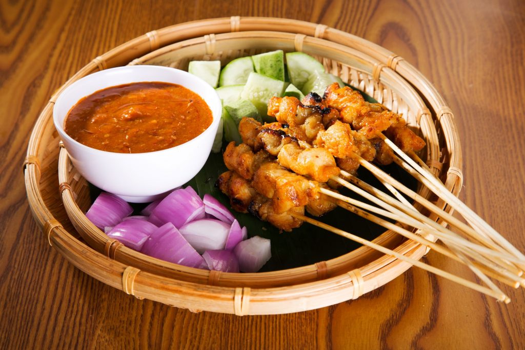 Malaysian chicken satay with delicious peanut sauce. famous food in Southeast Asia.
